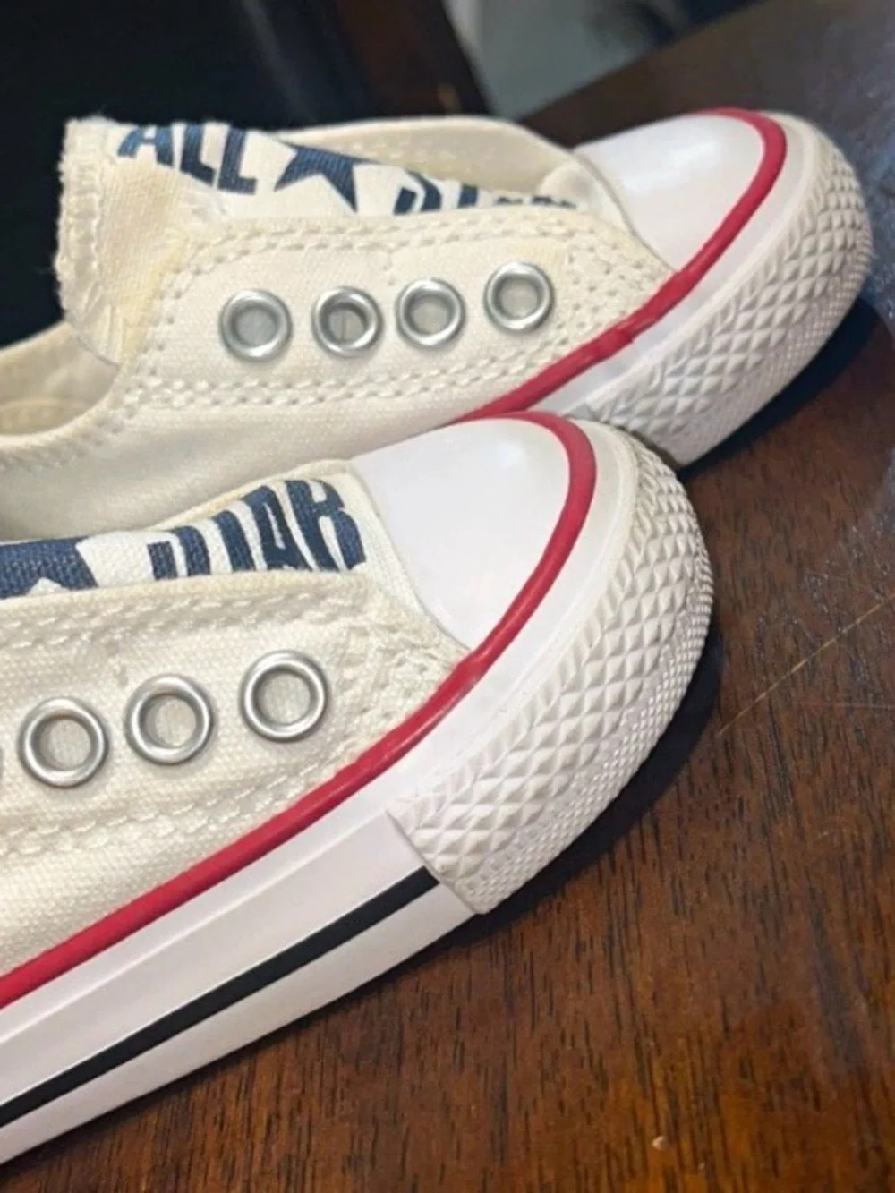 Converse Kids Canvas Slip-On Sneakers in Cream with Red Trim